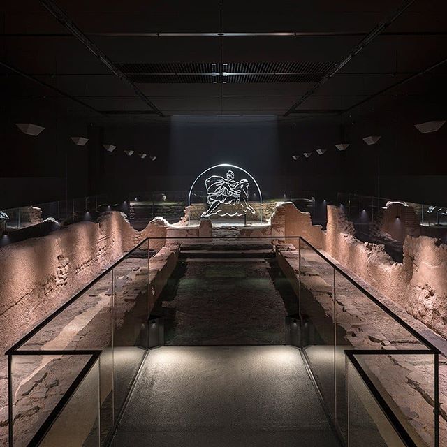 A subterranean Roman temple was restored to create this museum below ...