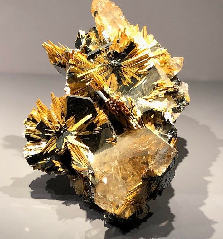 Rutile and hematite on quartz, from Brazil in 2020